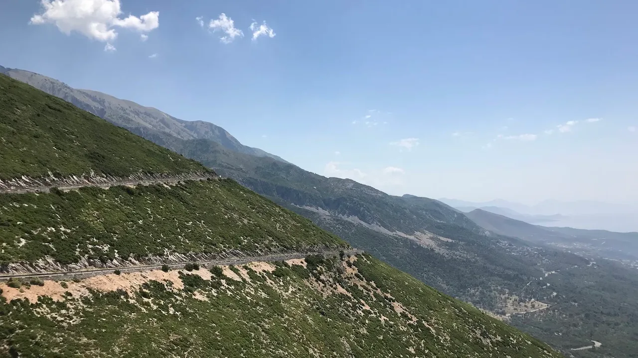 The SH8 coast road winding down through the Ceraunian Mountains on the Albanian Riviera