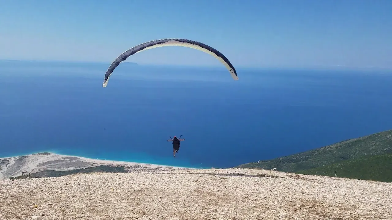 The mountain-and-sea panorama over the Albanian Riviera from Llogara Pass