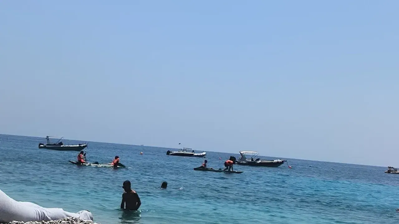 A sunset beach bar above the turquoise water at Dhërmi on the Albanian Riviera