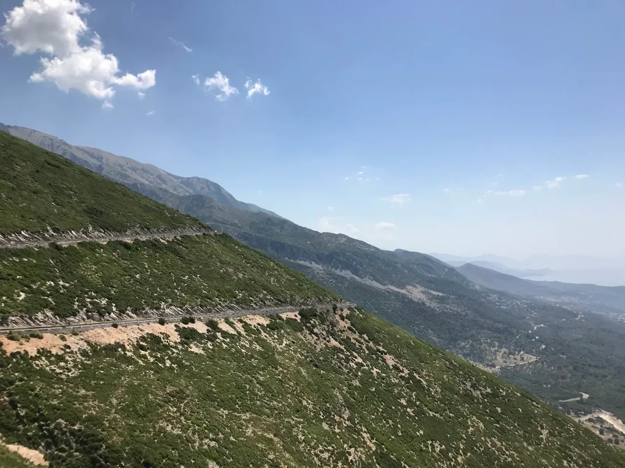 The Llogara Pass road winding through the Ceraunian Mountains above the Ionian coast