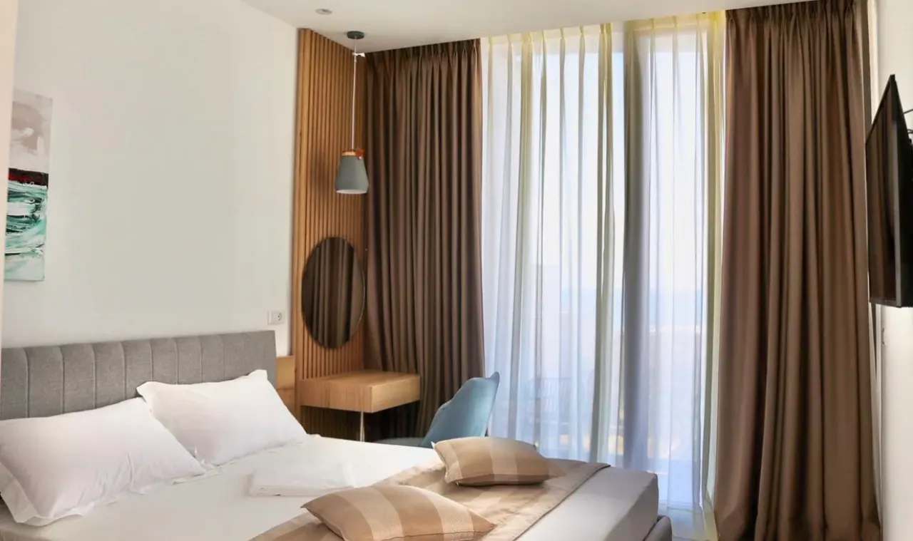A modern room at Vesper Suites in Dhërmi